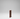 Wooden wine rack with multiple bottles on a gray background